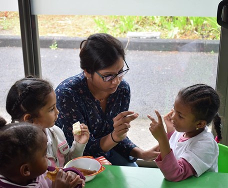 Our Marketing Department sharing some valuable moments over breakfast with our AfrAsia School kids.